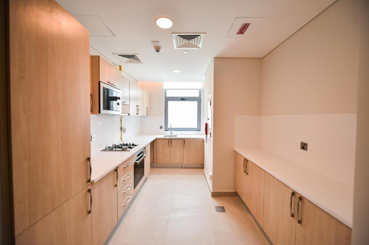 Waterfront Hotel Apartment Lusail Eksteriør billede A typical kitchen in a student flat