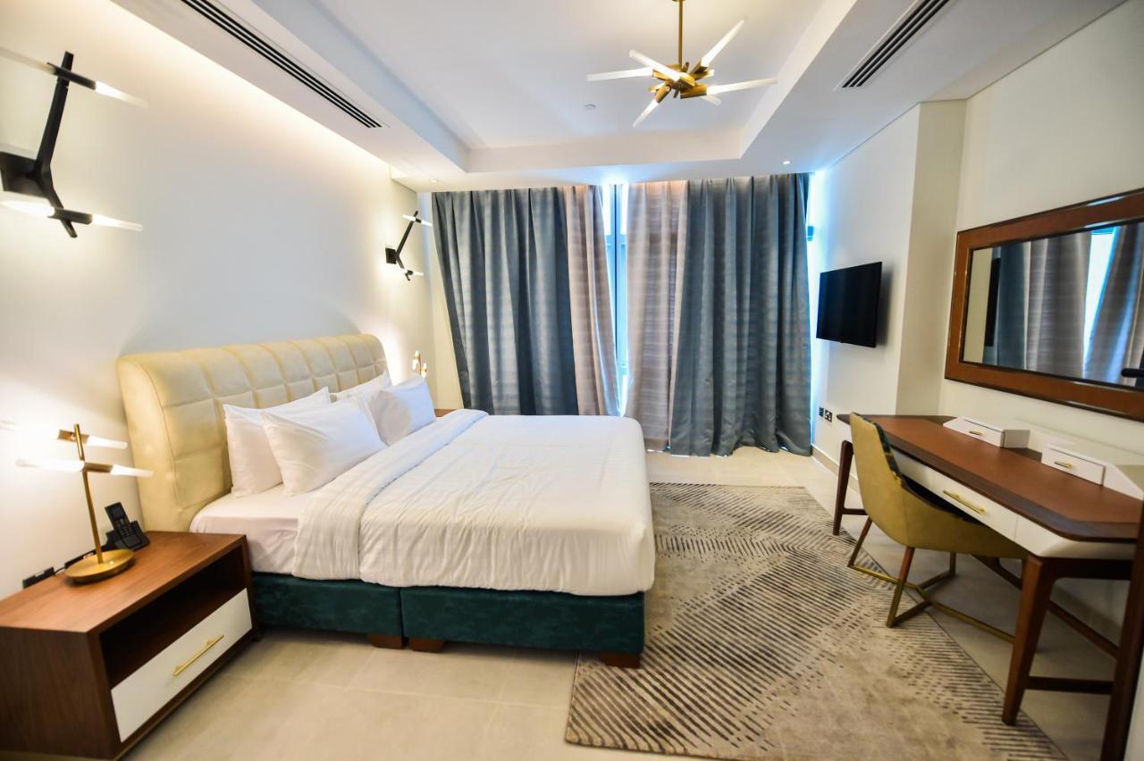 Waterfront Hotel Apartment Lusail Eksteriør billede A bedroom at the hotel