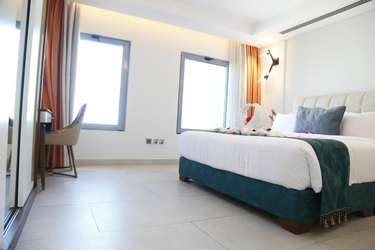 Waterfront Hotel Apartment Lusail Eksteriør billede A room at the hotel