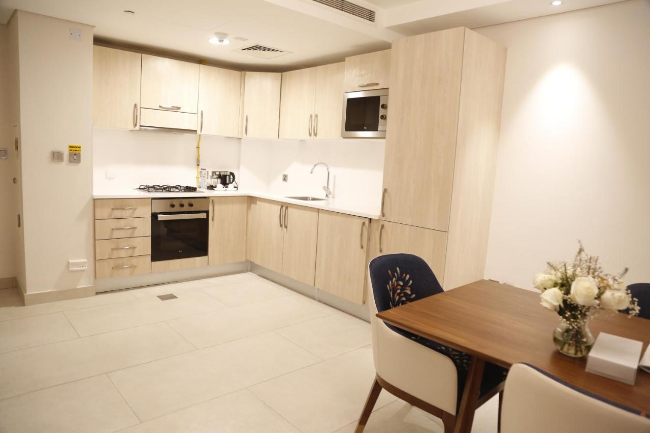 Waterfront Hotel Apartment Lusail Eksteriør billede A kitchen in a serviced apartment in London