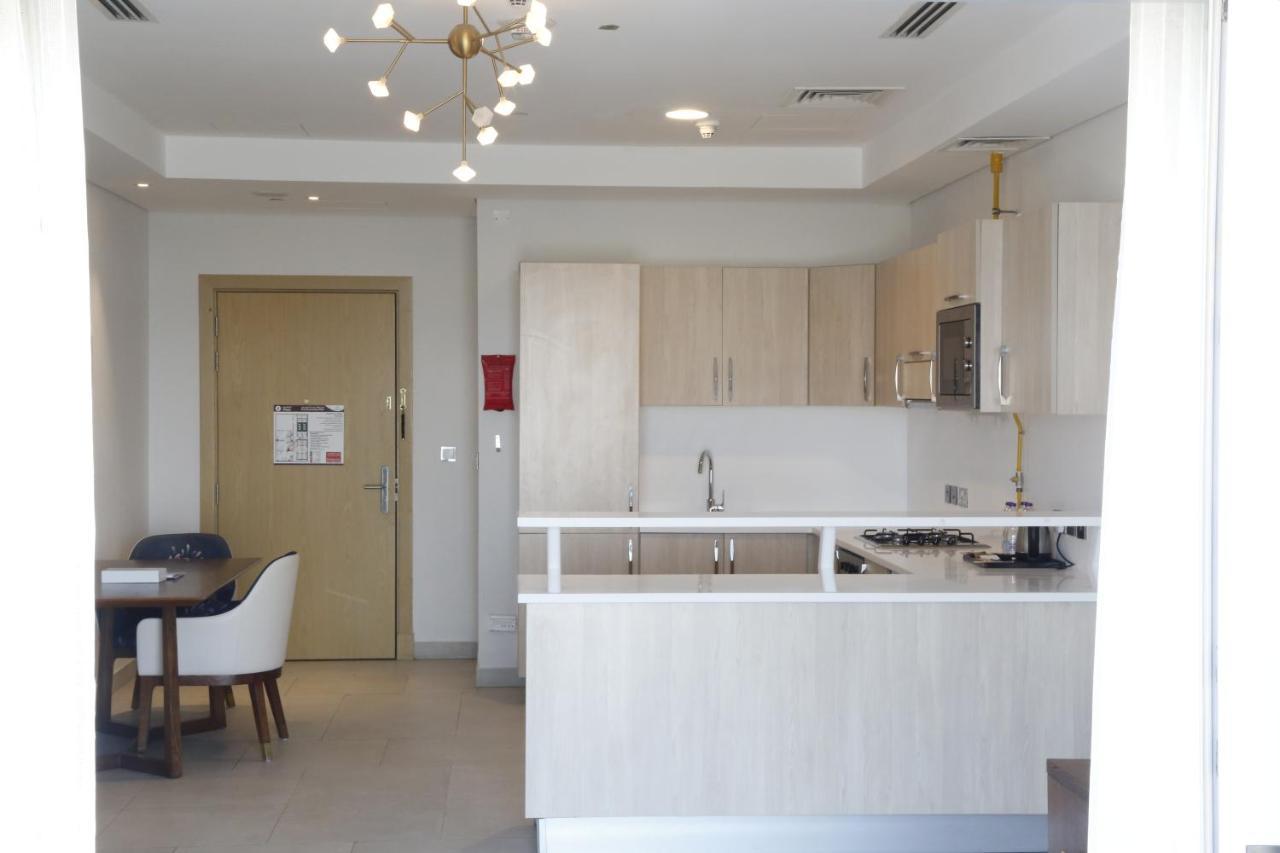 Waterfront Hotel Apartment Lusail Eksteriør billede A kitchen in a typical apartment
